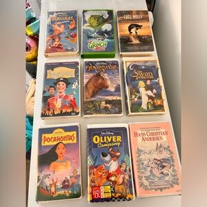 Vintage lot of VHS tapes. Some Disney and a previous Blockbuster title!
